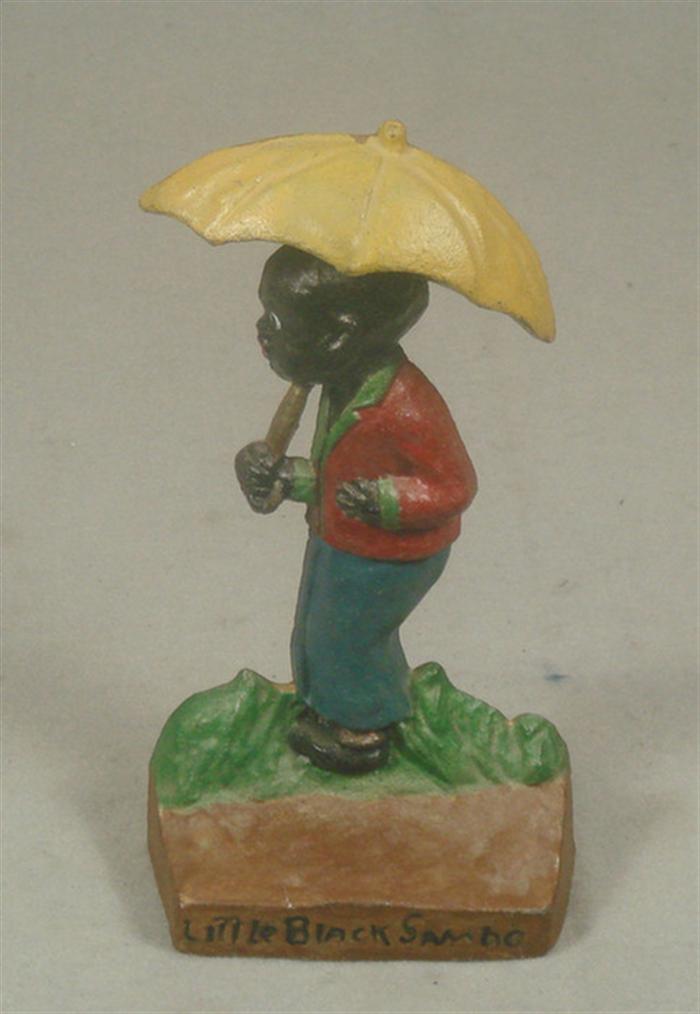 Appraisal: Cast iron doorstop child under umbrella on grassy base engraved