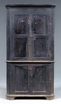 Appraisal: Southern corner cupboard yellow pine throughout with paneled doors and