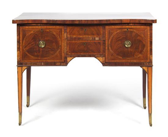 Appraisal: n English Mahogany Sideboard the shaped top over four drawers