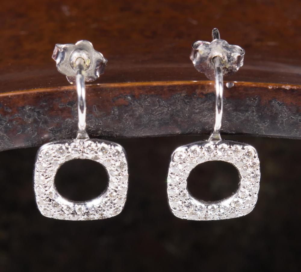 Appraisal: PAIR OF TIFFANY DIAMOND AND EIGHTEEN KARAT GOLD EARRINGS each