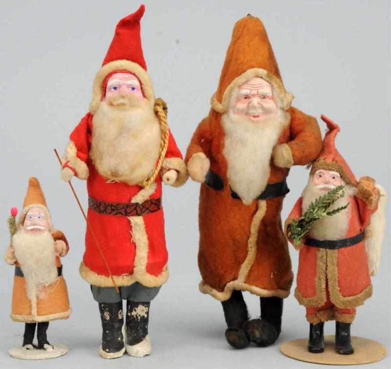 Appraisal: Lot of Santas with Composition Faces Japanese Condition Excellent Size