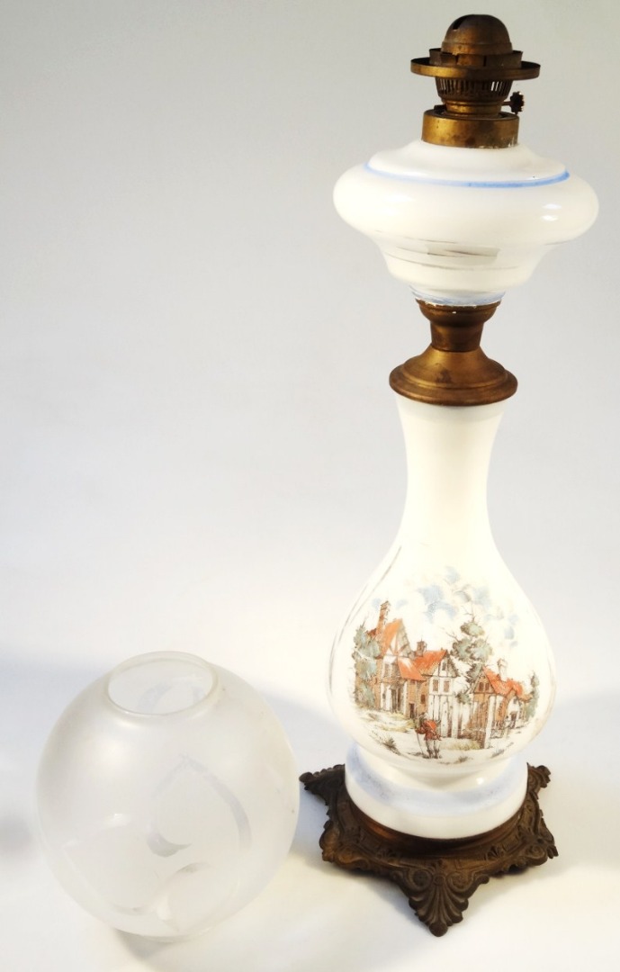 Appraisal: A Victorian milk glass and overlay lamp the bulbous body