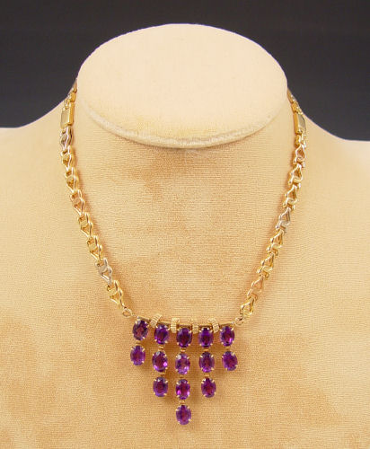 Appraisal: K AMETHYST NECKLACE K yellow gold necklace contains oval shaped