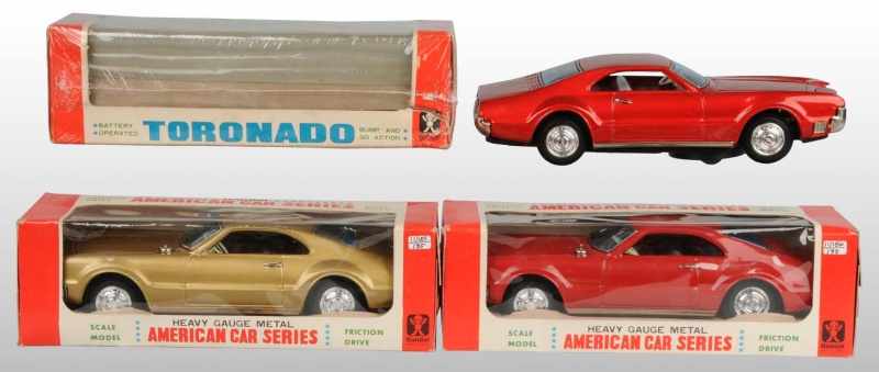 Appraisal: Lot of Tin Toronado Automobile Toys Description Japanese Circa s