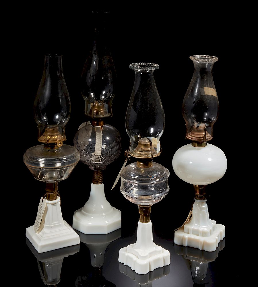 Appraisal: Four Glass Oil Lamps Four glass oil lamps with milk