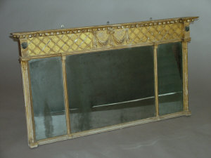 Appraisal: A giltwood overmantel mirror th century the inverted breakfront cornice