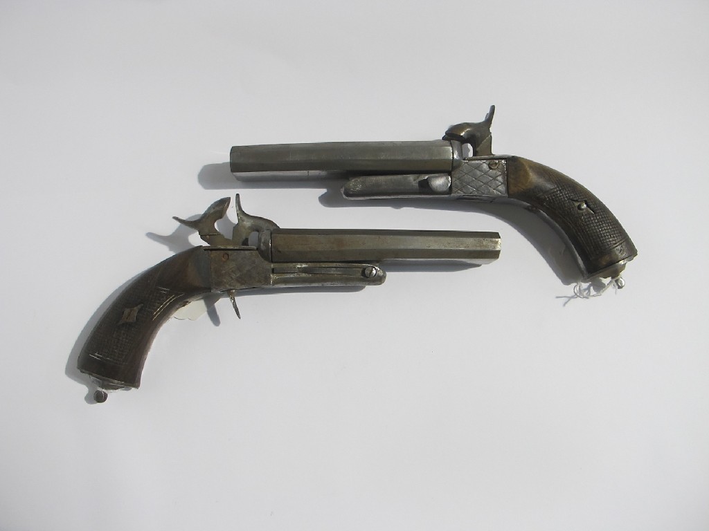 Appraisal: A pair of double barrelled pistols