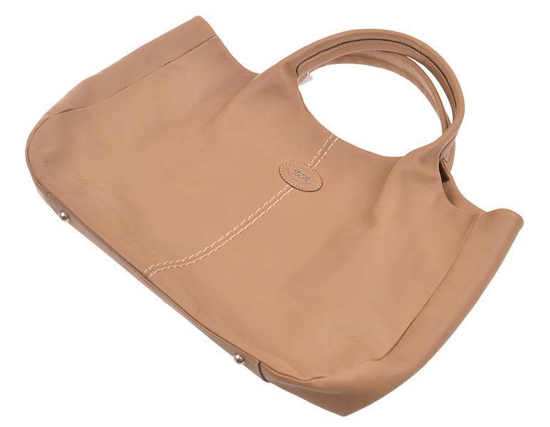 Appraisal: A TOTE BY TODS Styled in a putty coloured leather