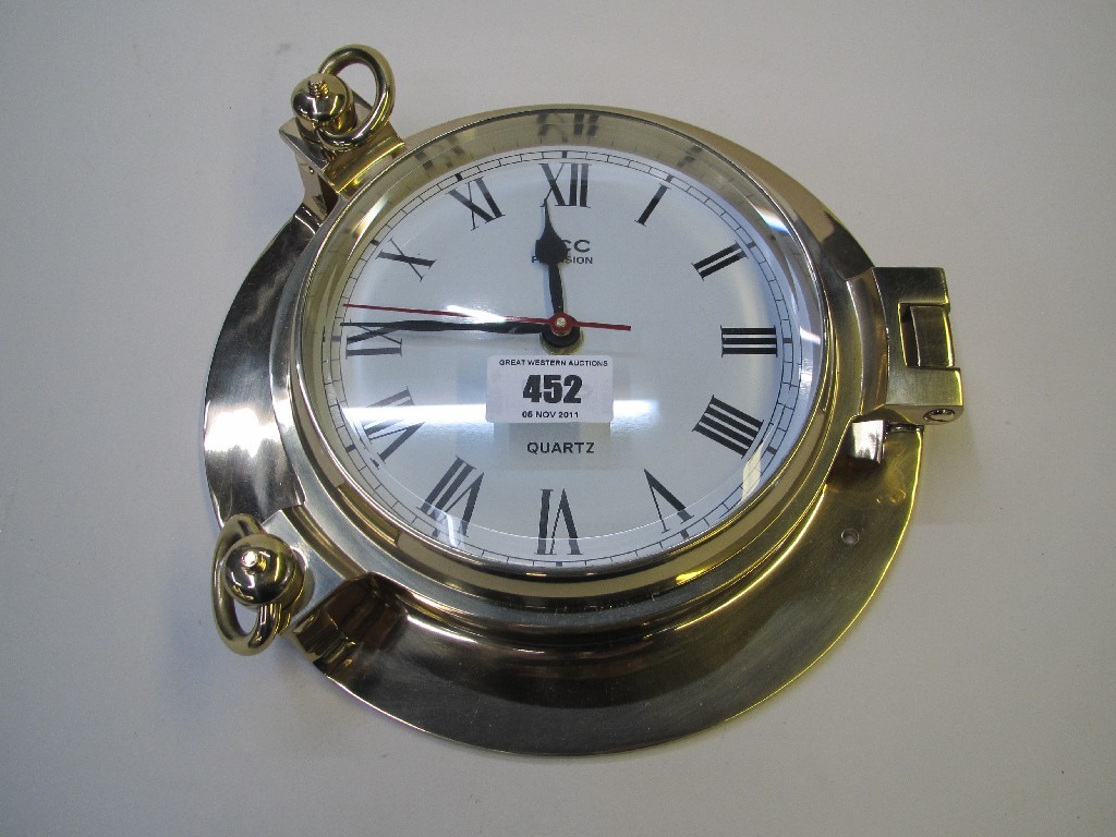 Appraisal: Quartz heavy brass cased 'Porthole' clock