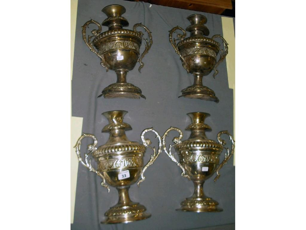 Appraisal: Set of four silver plated urn wall brackets each with