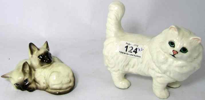 Appraisal: Beswick Pair of White Siamese Kittens and a White Persian