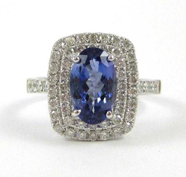 Appraisal: TANZANITE DIAMOND AND FOURTEEN KARAT GOLD RING The white gold