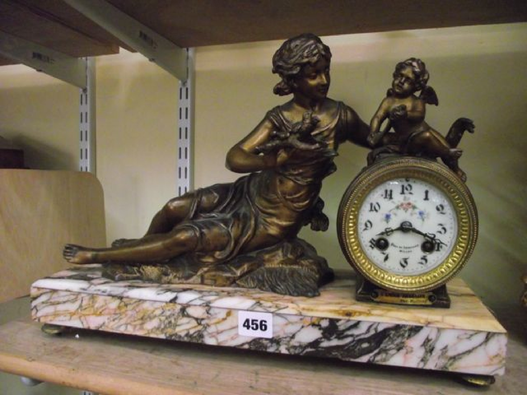 Appraisal: A th century spelter and marble mantel clock the -day