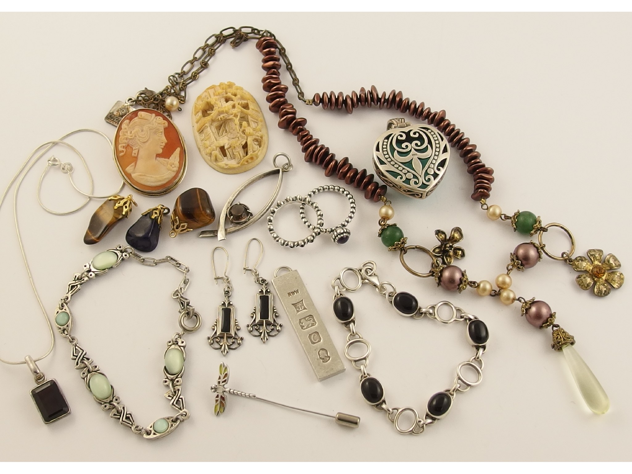 Appraisal: A collection of silver and costume jewellery to include a