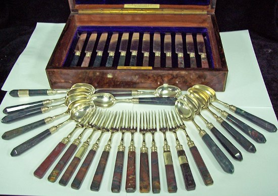 Appraisal: A Victorian dessert service comprising twelve knives twelve spoons and