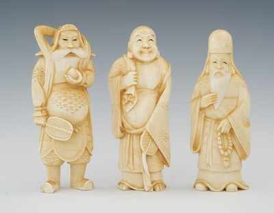 Appraisal: A Lot of Three Carved Ivory Figures Chinese The group