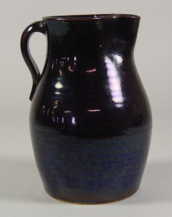 Appraisal: American Stoneware Pitcher Late th Century Brown glaze Glaze pop