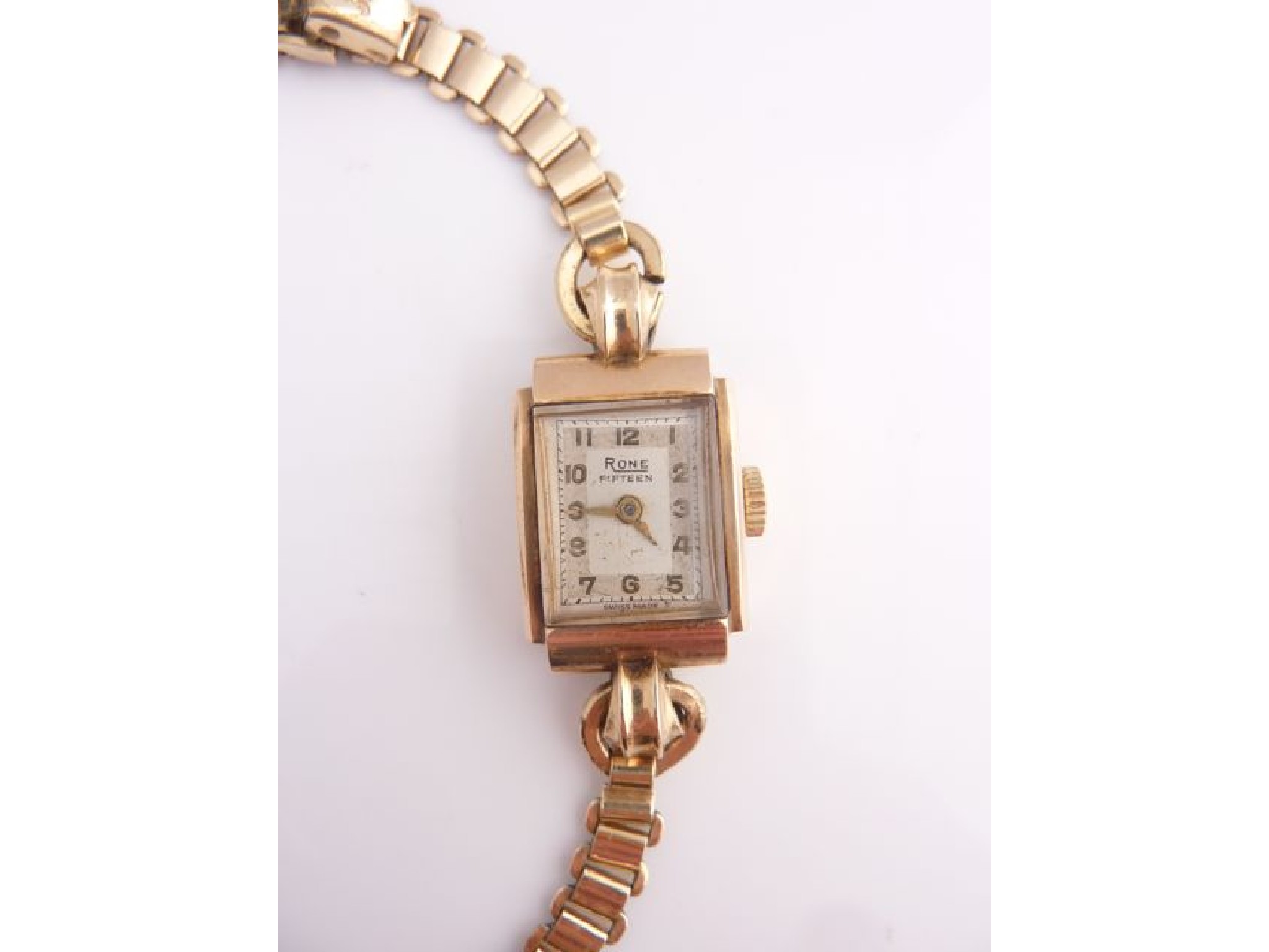 Appraisal: A lady's ct gold wristwatch Rone the rectangular silvered dial