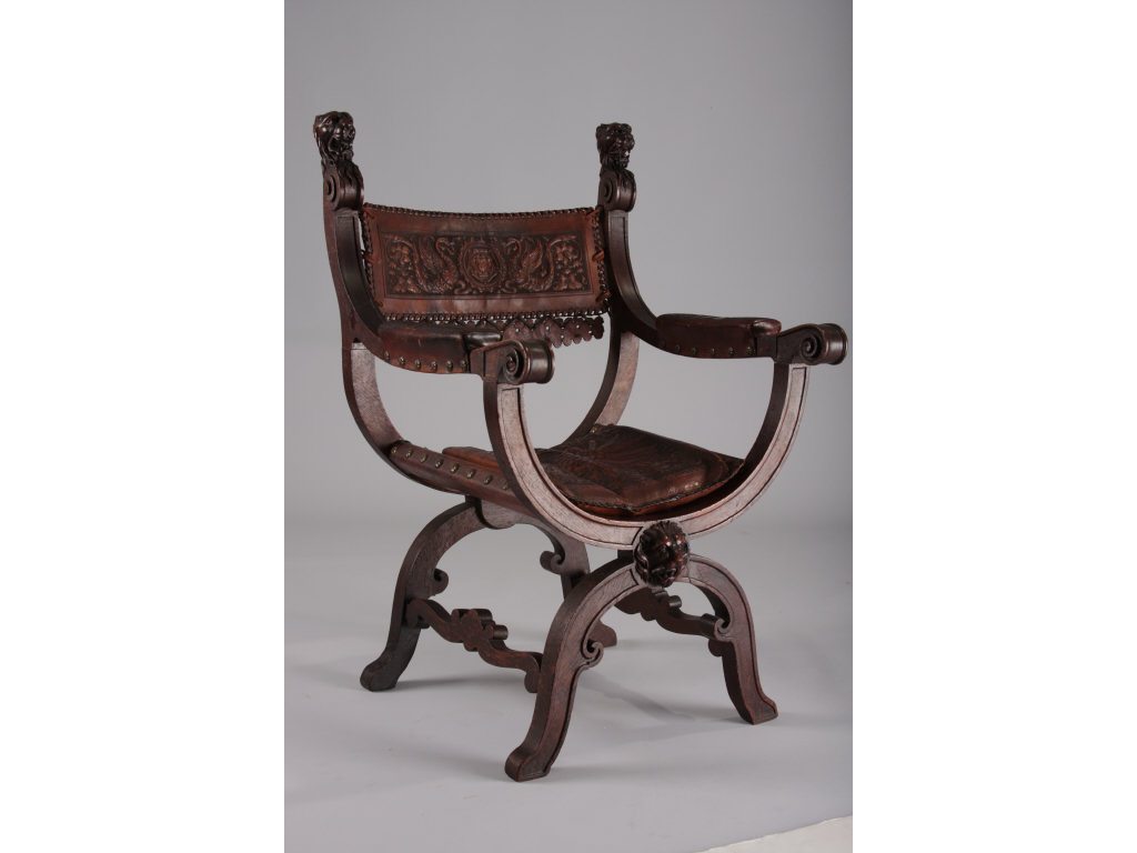 Appraisal: Carved Roman Curule Arm Chair th c carved figured oak