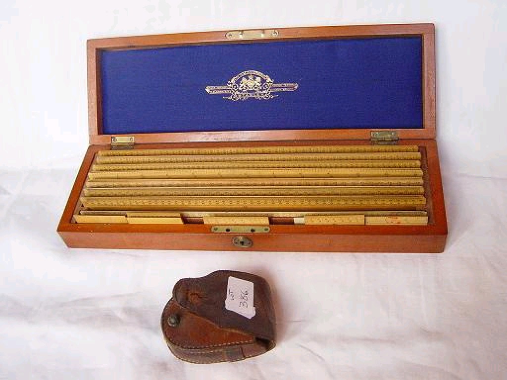 Appraisal: A Victorian mahogany box containing a selection of box wood