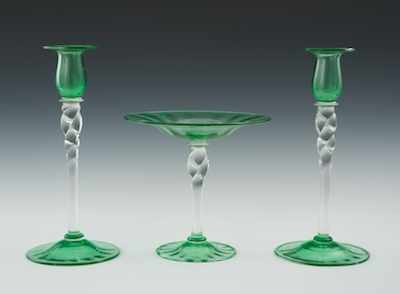 Appraisal: A Set of Steuben Glass Candlesticks and Tazza The matching