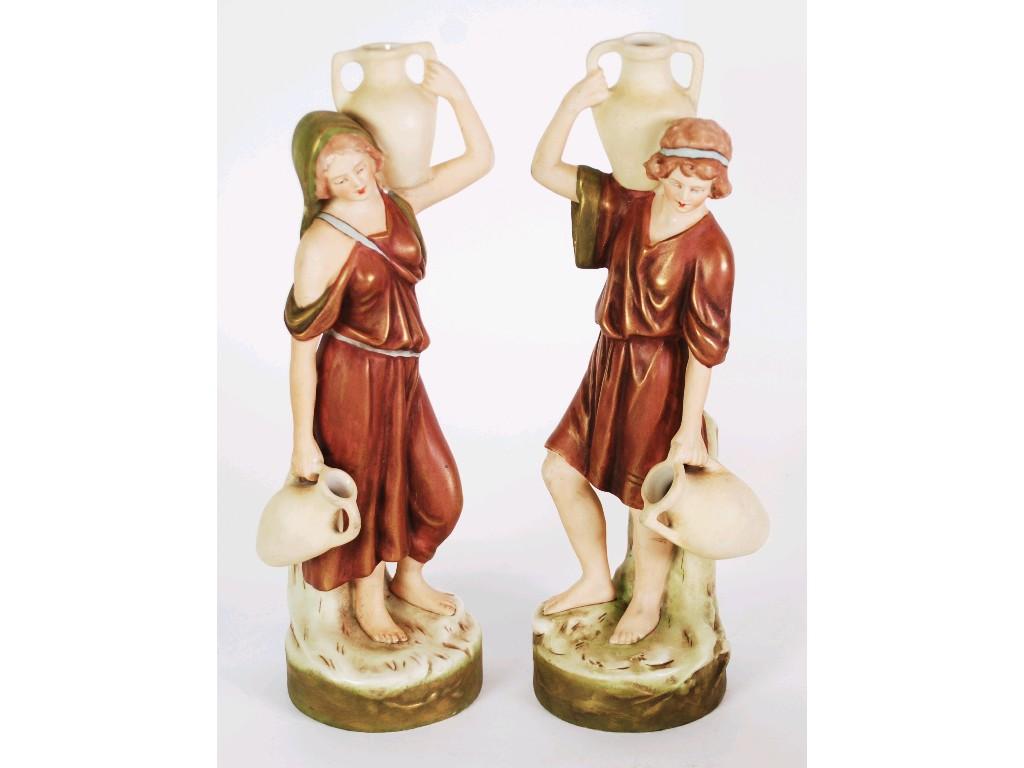 Appraisal: PAIR OF SMALL ROYAL DUX PORCELAIN FIGURE OF MALE AND