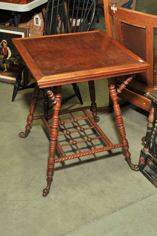 Appraisal: PARLOR TABLE Mixed woods having a square top turned legs