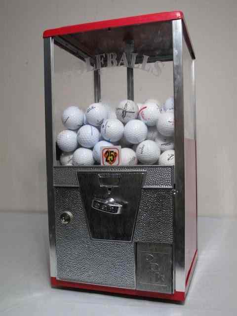 Appraisal: Vintage cent golf ball dispenser by ''OAK'' Red painted metal