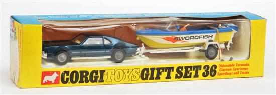 Appraisal: CORGI GIFT SET OLDSMOBILE TORONADO AND SPEEDBOAT including Oldsmobile Toronardo