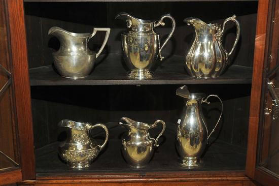 Appraisal: SIX STERLING PITCHERS All marked ''Sterling'' A four pint pitcher