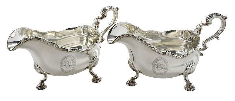 Appraisal: Pair George III English Silver Sauce Boats London urns with