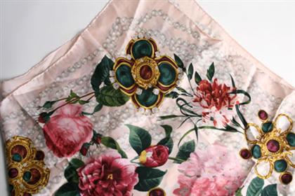 Appraisal: Chanel silk floral scarf Thirty-five inches square with camelia and