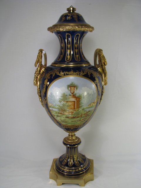 Appraisal: Large cobalt blue with hand painted porcelain urn Louis XVI