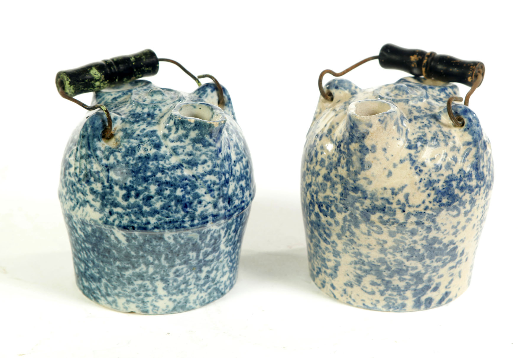 Appraisal: TWO SPONGEWARE JUGS Ohio early th century Two blue spongeware