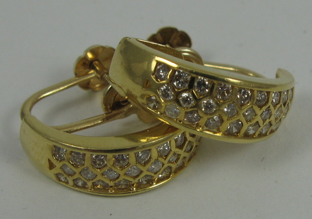 Appraisal: PAIR OF DIAMOND AND FOURTEEN KARAT GOLD EARRINGS each set