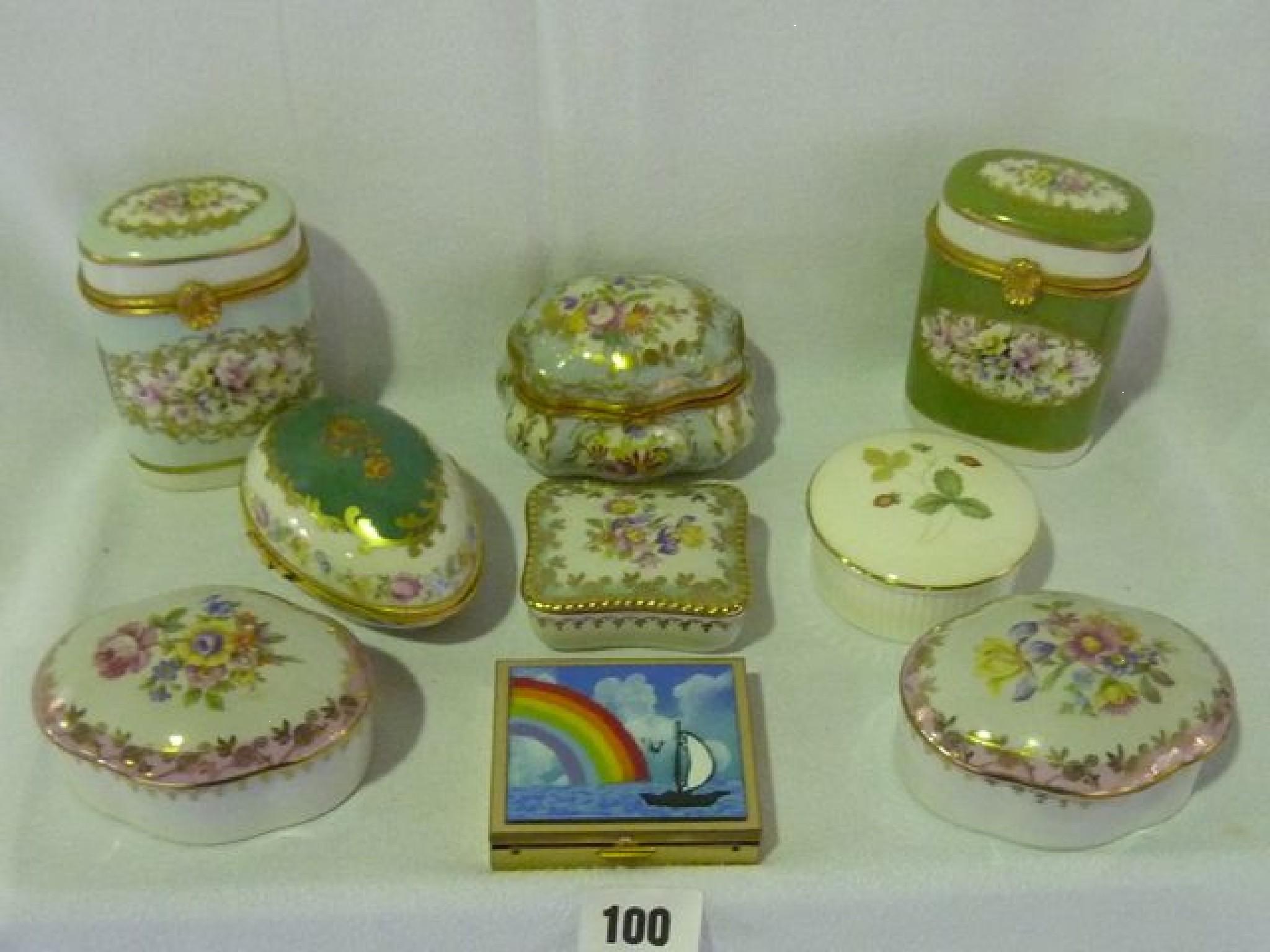 Appraisal: A collection of eight porcelain boxes with hand painted and