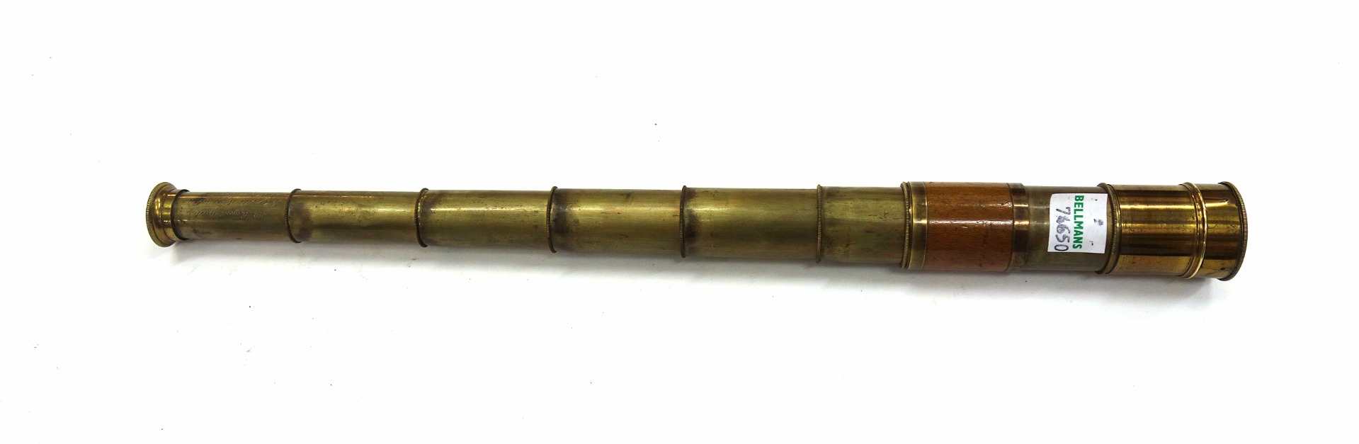 Appraisal: Negretti Zambra a brass six draw telescope with wooden casing