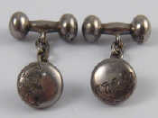 Appraisal: A pair of antique English silver cufflinks hallmarked Birmingham gms