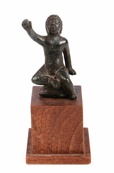 Appraisal: A Roman bronze figure of Eros height of figure in