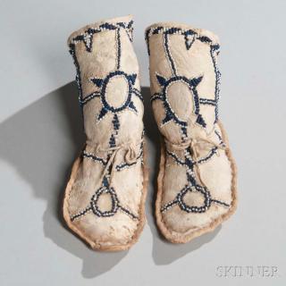 Appraisal: Apache Child's Beaded Hide High-Top Moccasins c the thick rawhide