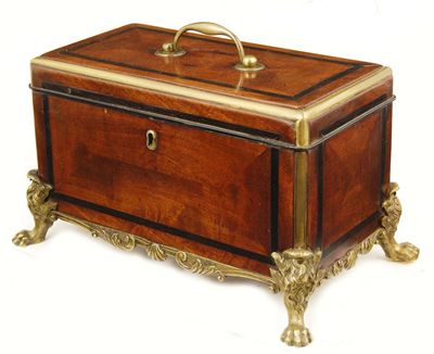 Appraisal: A George II mahogany and brass mounted tea caddy in