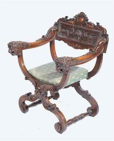 Appraisal: AN ANTIQUE ITALIAN CARVED OAK SAVANOROLA CHAIR with lion mask