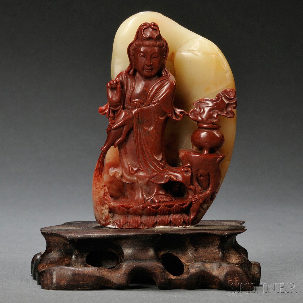 Appraisal: Soapstone Guanyin China standing with her right hand in the