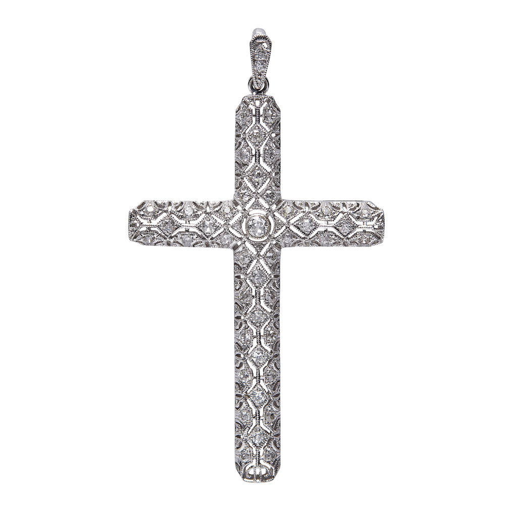 Appraisal: A diamond set cross pendant of traditional form with pierced