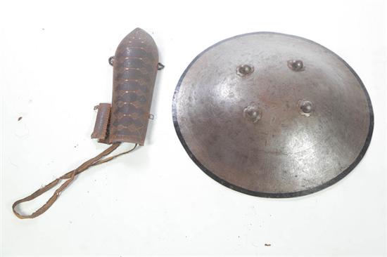 Appraisal: SHIELD AND ARM GUARD Probably Indo-Persian th- th century steel