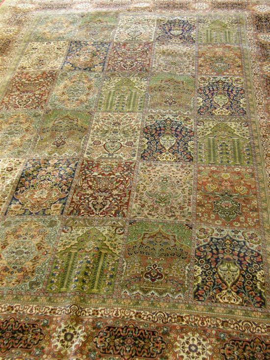 Appraisal: Modern Persian silk cream ground carpet five borders the main