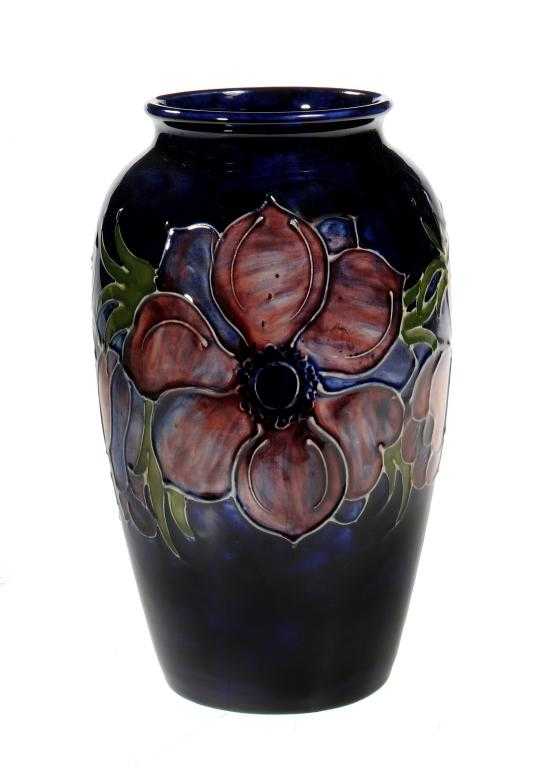 Appraisal: A MOORCROFT ANEMONE VASE DESIGNED BY WALTER MOORCROFT cm h