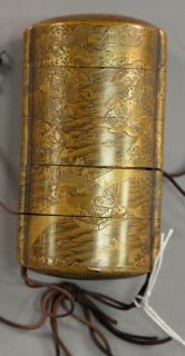 Appraisal: Japanese lacquered inro with gold landscape scene on each side