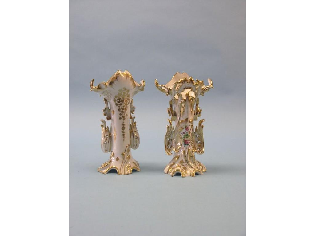 Appraisal: A pair of late th century French rococo-style porcelain vases