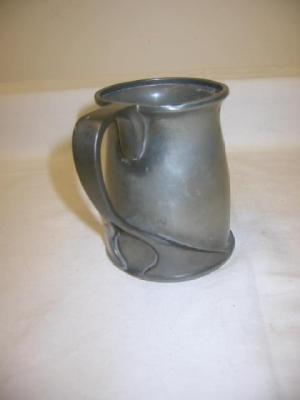 Appraisal: A TUDRIC PEWTER TANKARD by Archibald Knox of tapering form